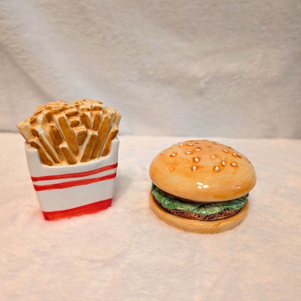 Vintage salt and pepper shakers hamburger  and fries.